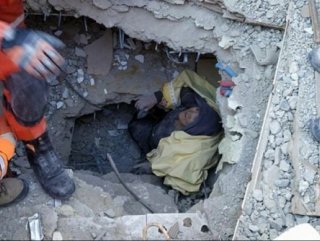 Elderly woman rescued from collapsed building